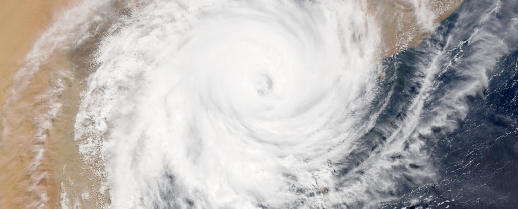 cyclone shown swirling up the ocean in its path