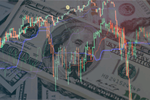 Stack of U.S. dollar bills overlaid with fluctuating forex candlestick charts, symbolizing managing exchange rate volatility in global markets.